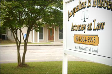 Jacqueline Busbee Law firm office and sign with contact info